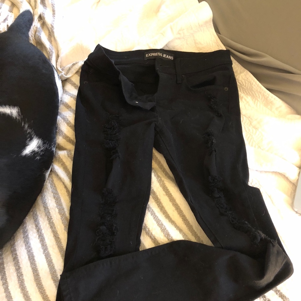 Express black distressed “legging” skinny jeans